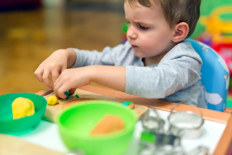 little-boy-working-with-clay.jpg